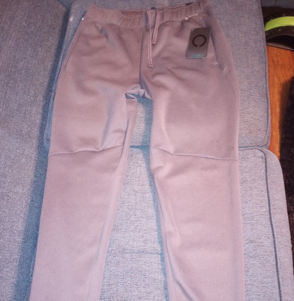 Skora running brand. Color grey. Size medium.